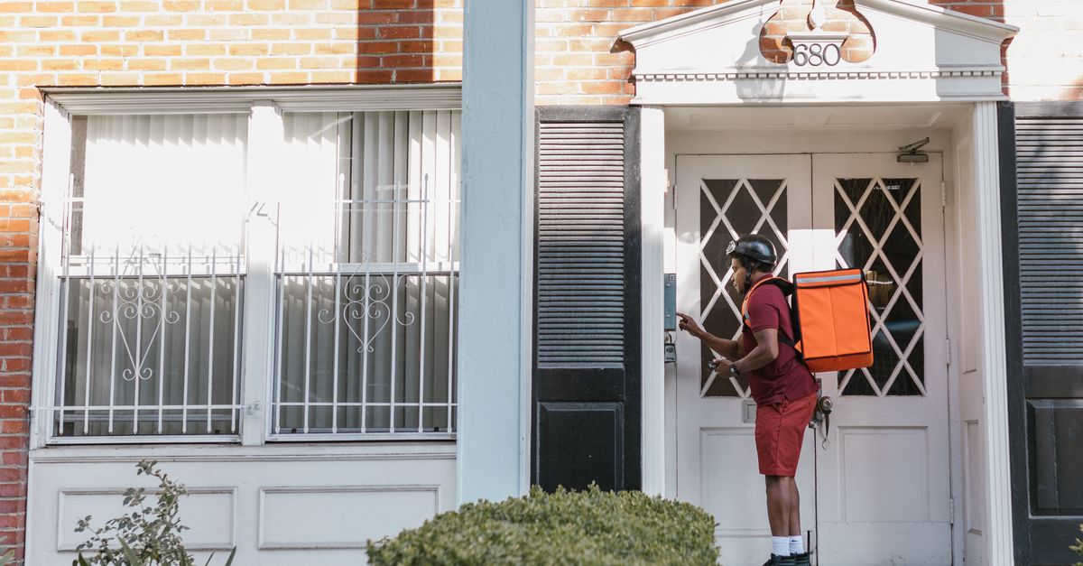 locksmith unlocking front door — Expert Pro Locksmith
